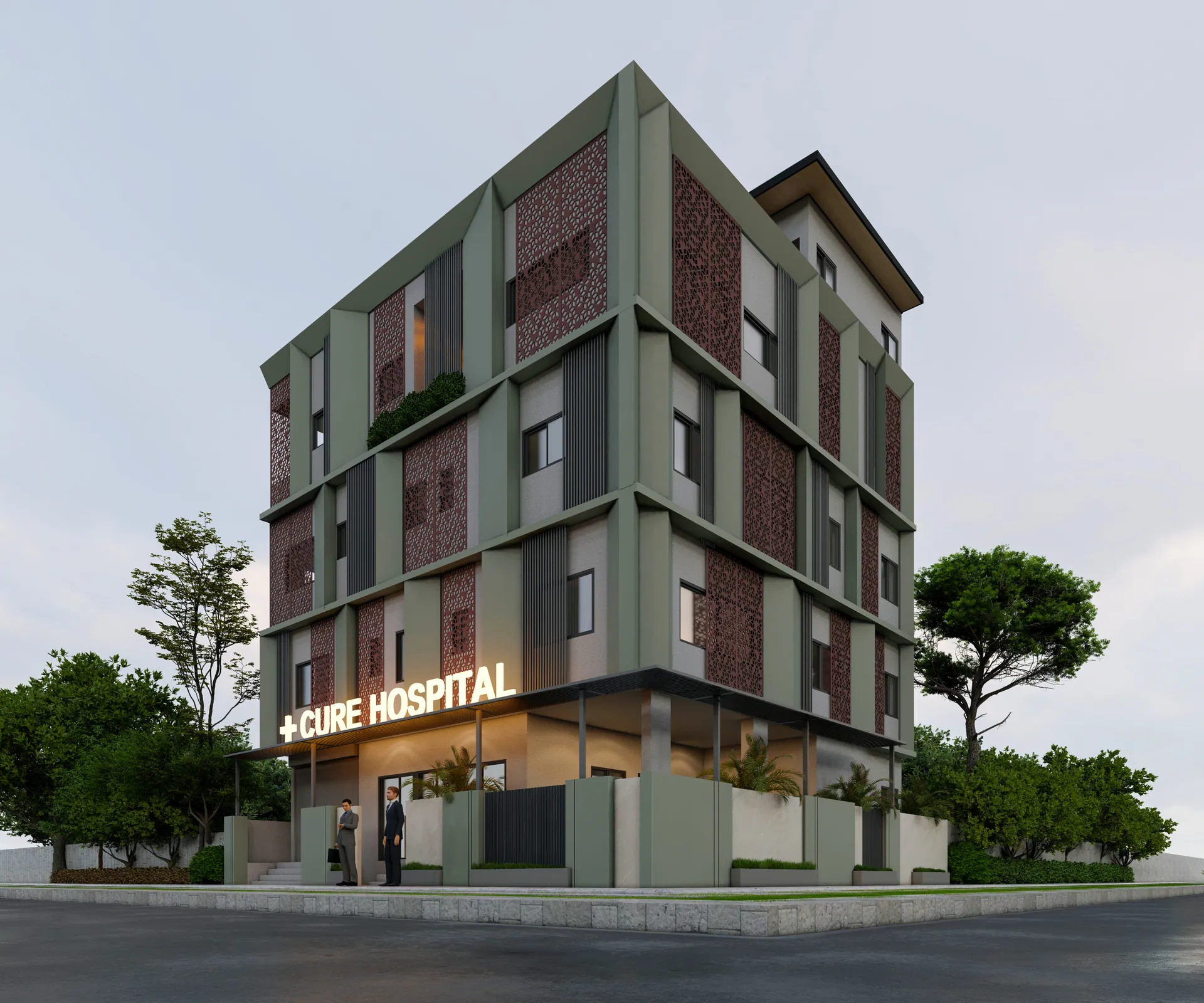 Five-storey hospital building with brick and grey cladding at a street corner